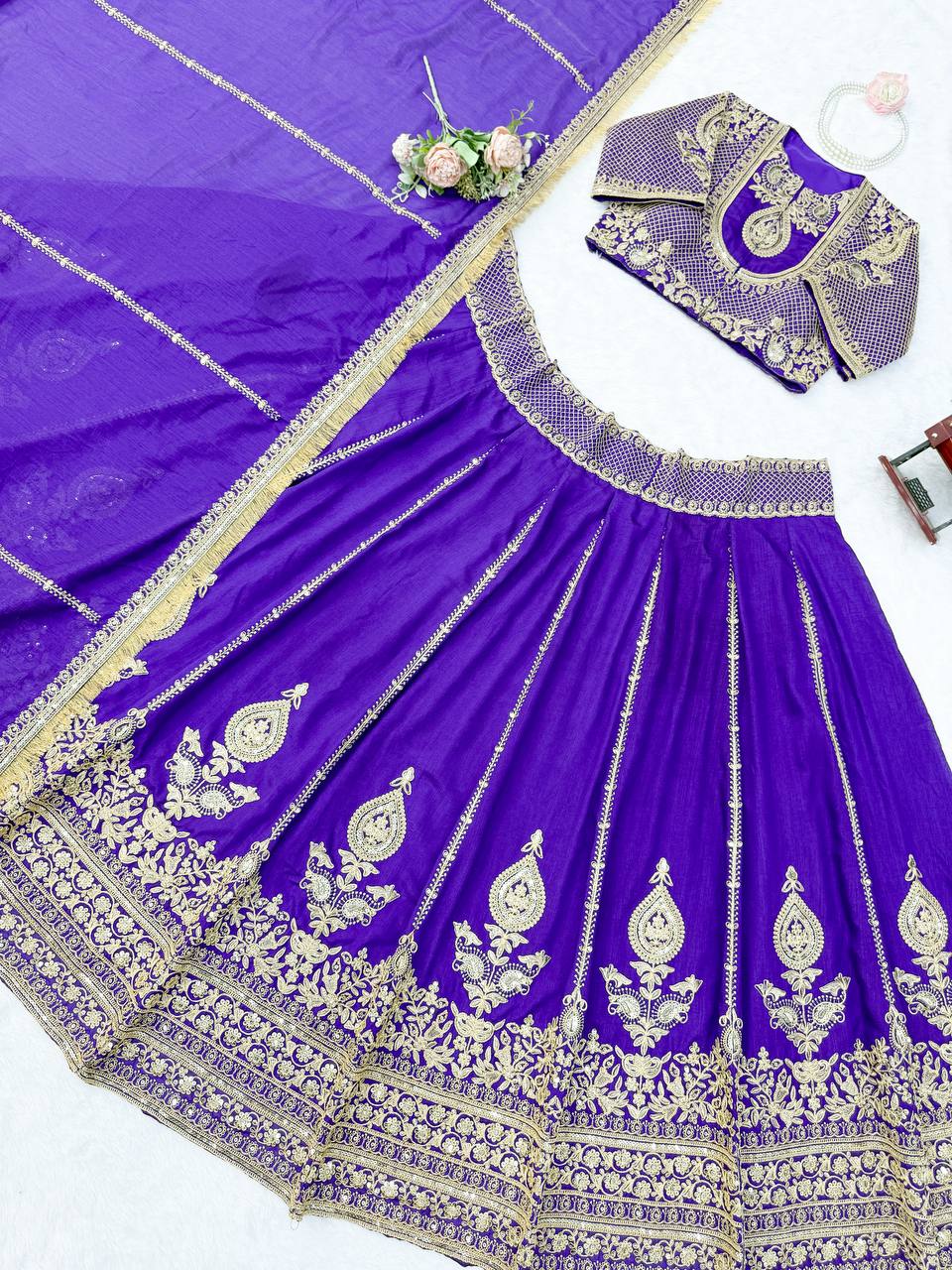 Royal Amethyst Purple Silk Lehenga Choli with Majestic Gold Zari Heritage Motifs and Elaborate Borders
